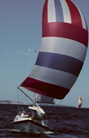 Powerful wind blowing the sails of a sailboat